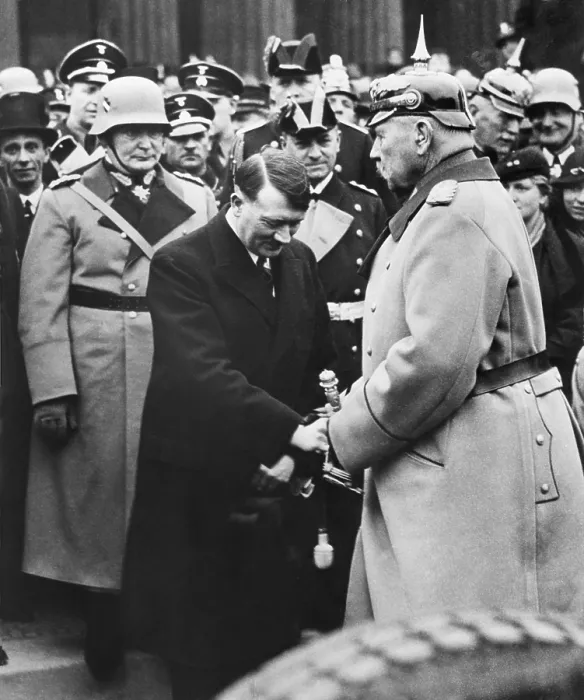 Framed Print : Newly appointed Chancellor Adolf Hitler greets President von Hindenburg at a memorial service. Berlin, 1933. Behind Hitler is Herman Goering and Joseph Goebbels