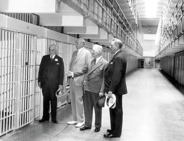 Framed Print : The newly built Alcatraz Federal Penitentiary receives official approval. From left: San Francisco Mayor Angelo Rossi, Attorney General Homer S. Cummings, Warden James A