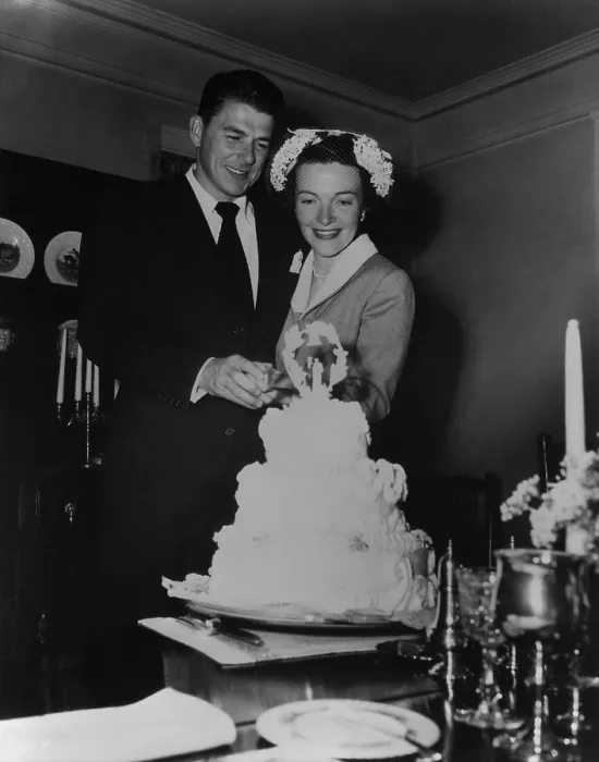 Framed Print : Newlyweds Ronald Reagan and Nancy Reagan cutting their wedding cake. March 4 1952. PO-USP-Reagan-Marriage_NA-12-0058M Framed Print : Newlyweds Ronald Reagan and Nancy Reagan cutting their wedding cake. March 4 1952. PO-USP-Reagan-Marriage_NA-12-0058M
