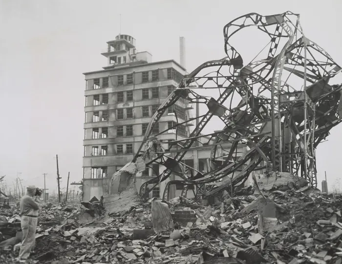 Framed Print : News photographer (lower left) documenting ruins in Hiroshima in 1947. It is possibly Stanley Troutman, returning to the ruins he photographed as a combat photographer in Sept Framed Print : News photographer (lower left) documenting ruins in Hiroshima in 1947. It is possibly Stanley Troutman, returning to the ruins he photographed as a combat photographer in Sept