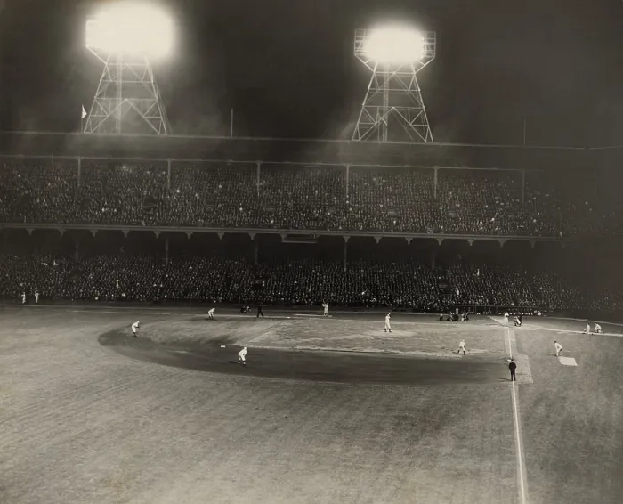 Framed Print : Night baseball at Ebbets Field in Brooklyn, with the Dodgers playing the Cincinnati Reds. Flood lights on towers illuminate the field in the 1940s. (BSLOC_2018_4_120)