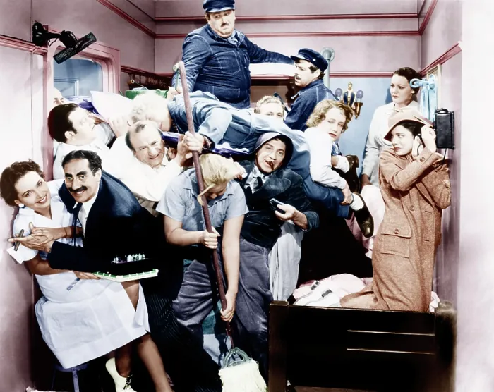Framed Print : A NIGHT AT THE OPERA, left from top: Jack Lipson, Frank Yaconelli; middle row second, third and fourth from left: Harpo Marx (sleeping), Allan Jones