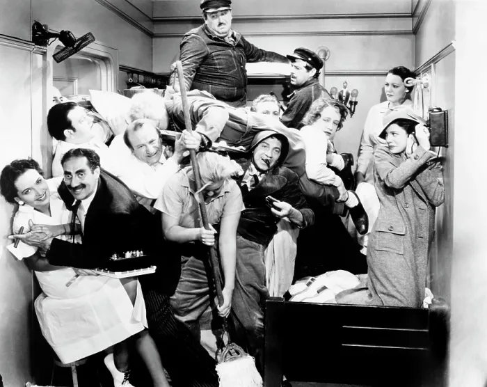 Framed Print : A NIGHT AT THE OPERA, left from top: Jack Lipson, Frank Yaconelli; middle row second, third and fourth from left: Harpo Marx (sleeping), Allan Jones