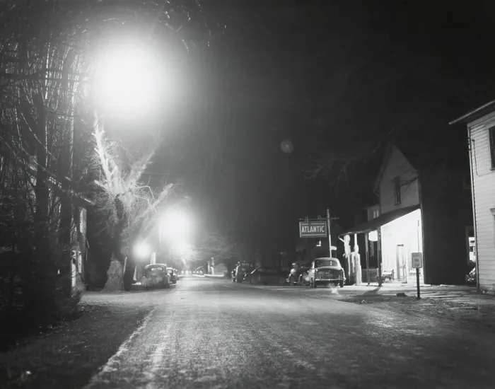 Framed Print : Night scene in a newly electrified town somewhere in rural American. Ca. 1940