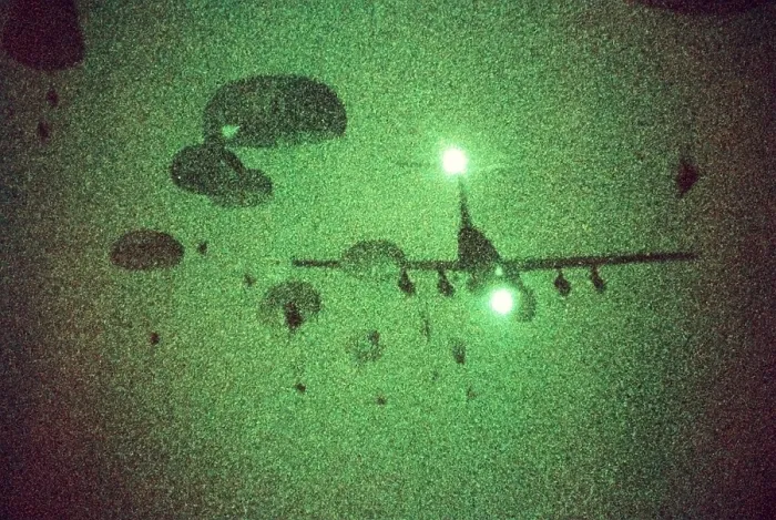 Framed Print : Night vision image of Paratroopers of the 82nd Airborne jumping from C-141 Starlifter aircraft. Sept. 12 1989. (BSLOC_2011_12_273)