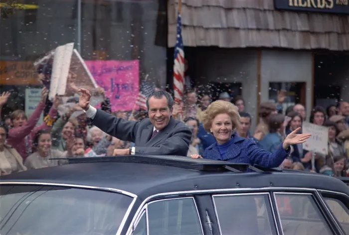 Framed Print : Nixon 1972 Re-election Campaign. President and Pat Nixon wave from the sun roof of their limousine in a motorcade through New Rochelle N.Y. Oct. 24 1972
