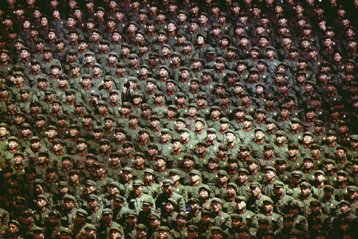 Framed Print : Nixon in China. Uniformed soldiers of the People's Army attending a sports exhibition attended by President Nixon in Beijing. Feb. 23 1972