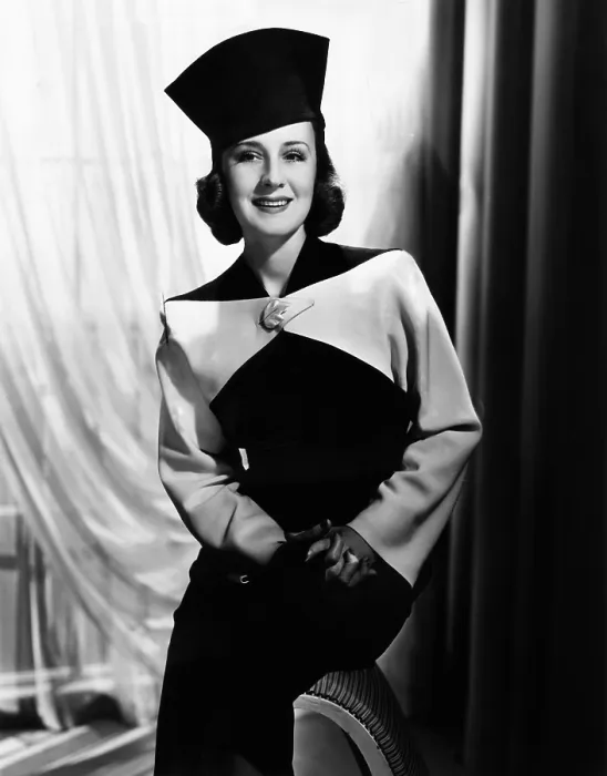 Framed Print : Norma Shearer, modeling a black and white fall suit, 1938