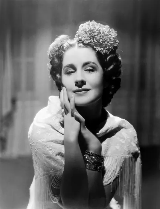 Framed Print : Norma Shearer, modeling a crimson floral hair arrangement, 1936 Framed Print : Norma Shearer, modeling a crimson floral hair arrangement, 1936