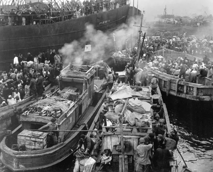 Framed Print : North Korean refugees crowd on the decks of a South Korean LST and many fishing boats Framed Print : North Korean refugees crowd on the decks of a South Korean LST and many fishing boats