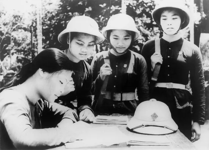 Framed Print : North Vietnamese woman joins People's Army of Vietnam. A young woman member of the Hanoi woman's militia, enlists in the army to fight with North Vietnamese forces. 1965