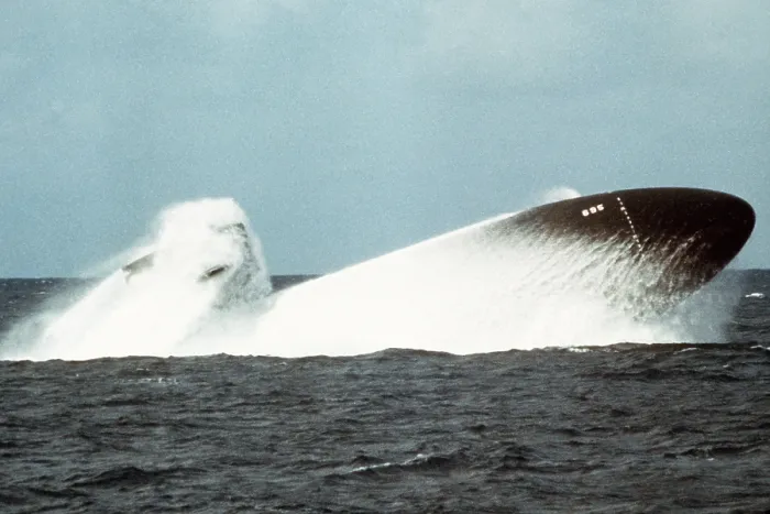 Framed Print : The nuclear-powered attack submarine BIRMINGHAM conducting an emergency surfacing exercise during sea trials. Nov. 19 1978. (BSLOC_2011_12_250)