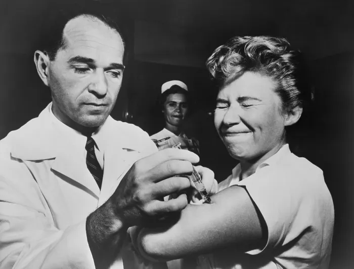 Framed Print : A nurse at Montefiore Hospital receives a flu vaccination in 1957. The 1956-58 Asian Flu was a category 2 flu pandemic that originated in China in early 1956. - (BSLOC_2015_1_191)