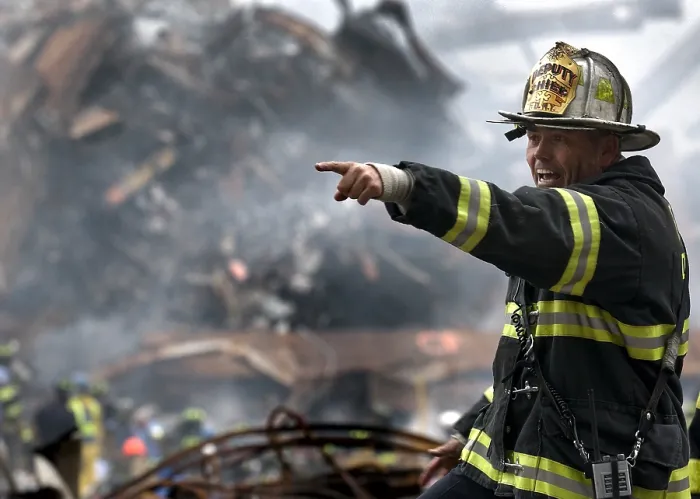 Framed Print : A NY Fire Department Deputy Chief calls for rescue teams at Ground Zero on Sept. 16, 2001. World Trade Center, New York City, after September 11, 2001 terrorist attacks. U.S Framed Print : A NY Fire Department Deputy Chief calls for rescue teams at Ground Zero on Sept. 16, 2001. World Trade Center, New York City, after September 11, 2001 terrorist attacks. U.S