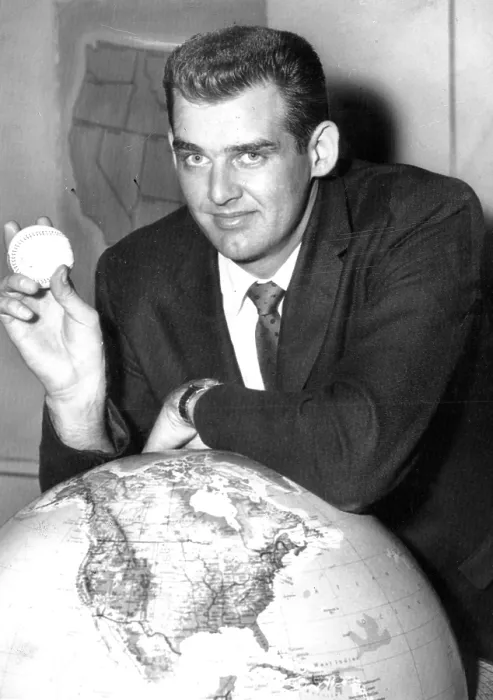 Framed Print : NY Yankee Pitcher Don Larsen shows off baseball he used to pitch perfect game against Brooklyn Dodgers in Game 5 of 1956 World Series on 10-08-56. Photo dated 10-09-56