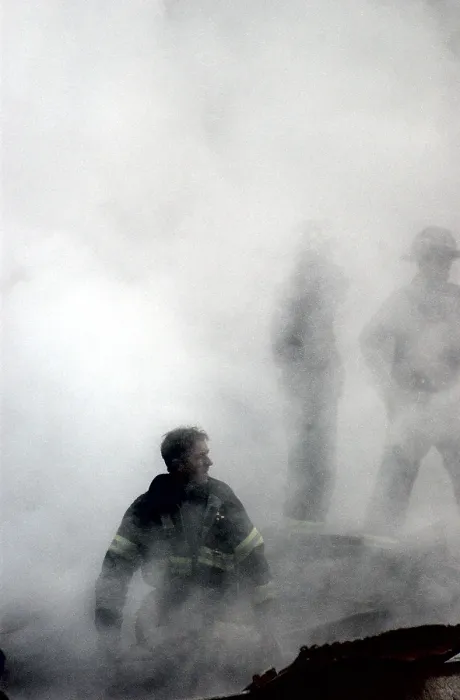 Framed Print : NYC Fireman emerges from the smoke and debris of the World Trade Center on Sept. 14, 2001. New York City, after September 11, 2001 terrorist attacks. U.S