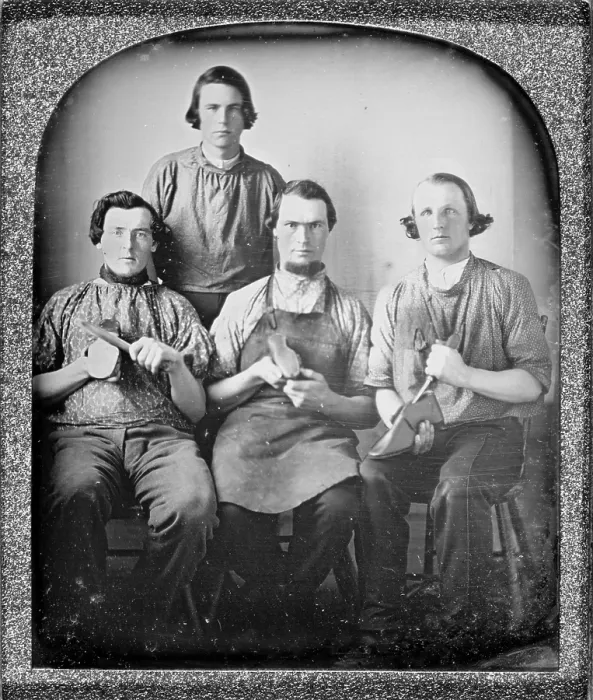 Framed Print : Occupational group portrait of four cobblers, holding shoes and shoe making equipment. sixth plate daguerreotype ca 1840-1860 Framed Print : Occupational group portrait of four cobblers, holding shoes and shoe making equipment. sixth plate daguerreotype ca 1840-1860