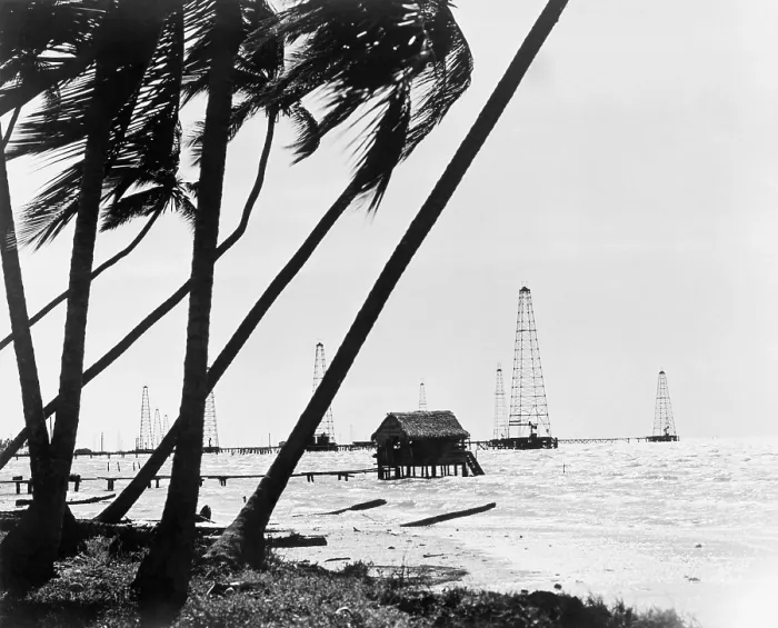 Framed Print : Oil derricks off the shore in Maracaibo Lake, Venezuela owned by Standard Oil Corporation of New Jersey. 1944