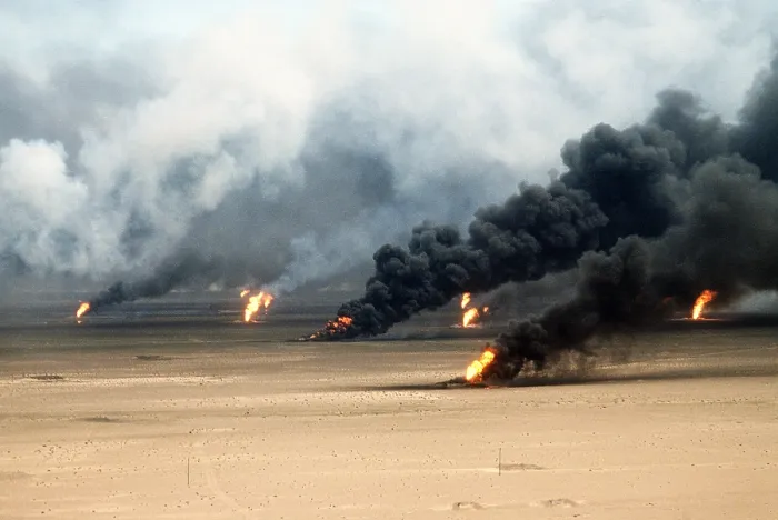 Framed Print : Oil well fires rage outside Kuwait City in the aftermath of the First Gulf War. Retreating Iraqi troops set fire to Kuwait's oil fields. Mar. 21 1991. (BSLOC_2011_3_14)