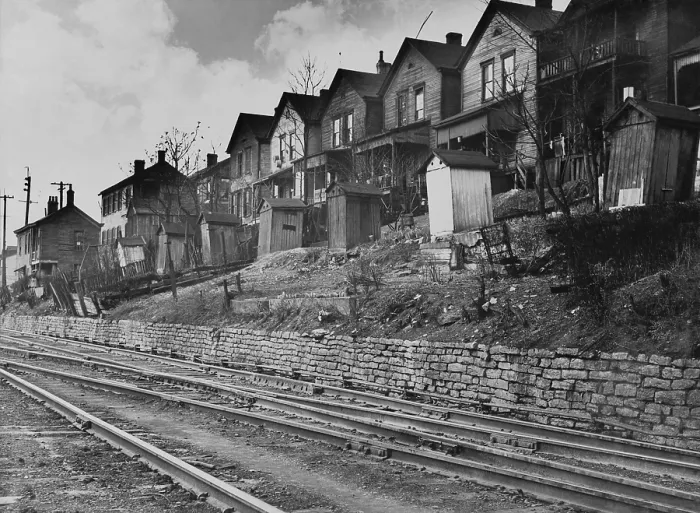 Framed Print : Old wooden housing with latrines in their backyards lining the railroad tracks in Cincinnati, Ohio