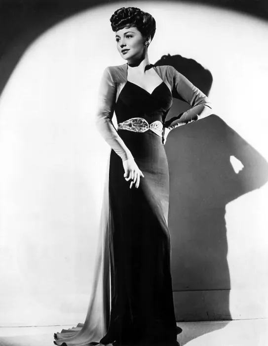 Framed Print : Olivia De Havilland in a black crepe evening gown, 1941