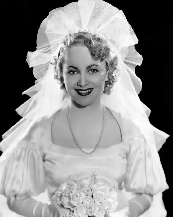 Framed Print : Olivia De Havilland in fashion wedding gown, 1935
