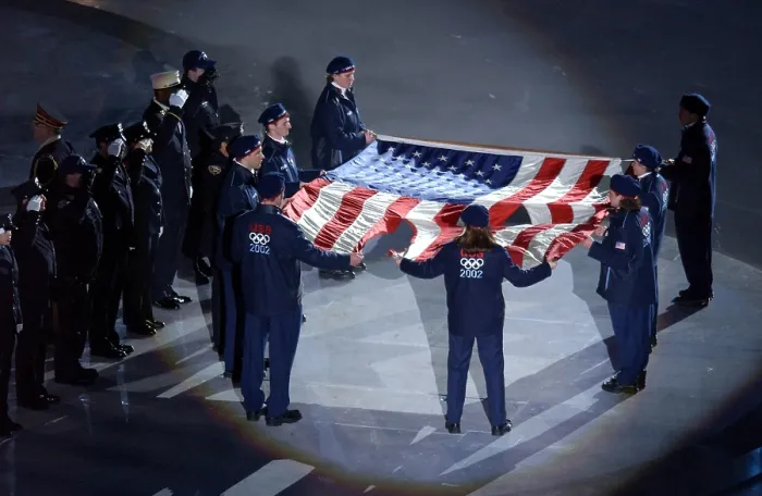 Framed Print : The US Olympic Team holds the American flag that flew over the Ground Zero on Sept. 11, 2001 Framed Print : The US Olympic Team holds the American flag that flew over the Ground Zero on Sept. 11, 2001