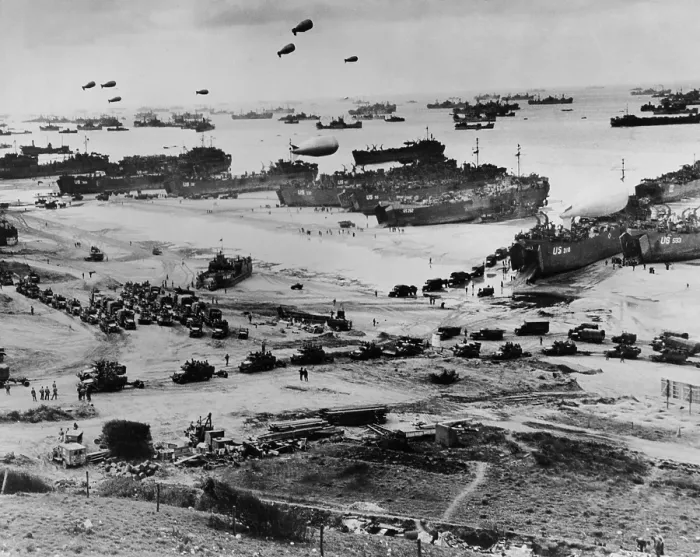 Framed Print : Omaha Beach after D-Day. Protected by barrage balloons, ships delivered trucks loaded with supplies. June 7-10, 1944, World War 2. Normandy, France, World War 2. (BSLOC_2014_2_50)