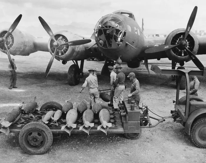 Framed Print : An ordnance crew loading 300 pound bombs into a U.S. Air Force bomber, Hawaii, 1942.. Courtesy: CSU Archives / Everett Collection Framed Print : An ordnance crew loading 300 pound bombs into a U.S. Air Force bomber, Hawaii, 1942.. Courtesy: CSU Archives / Everett Collection