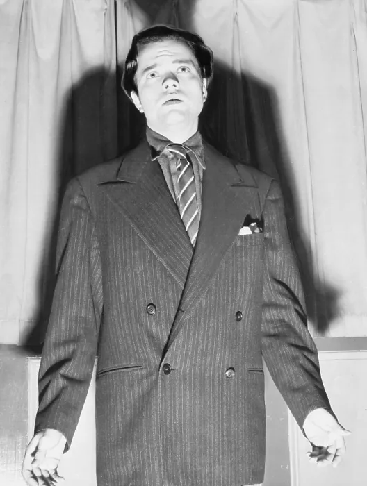 Framed Print : Orson Welles (1915-1985) with his shadow in an expressive portrait from 1938