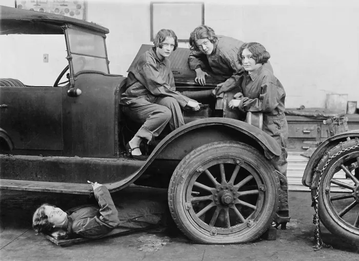 Framed Print : Overall clad high school girls learn automobile mechanics in Washington, D.C