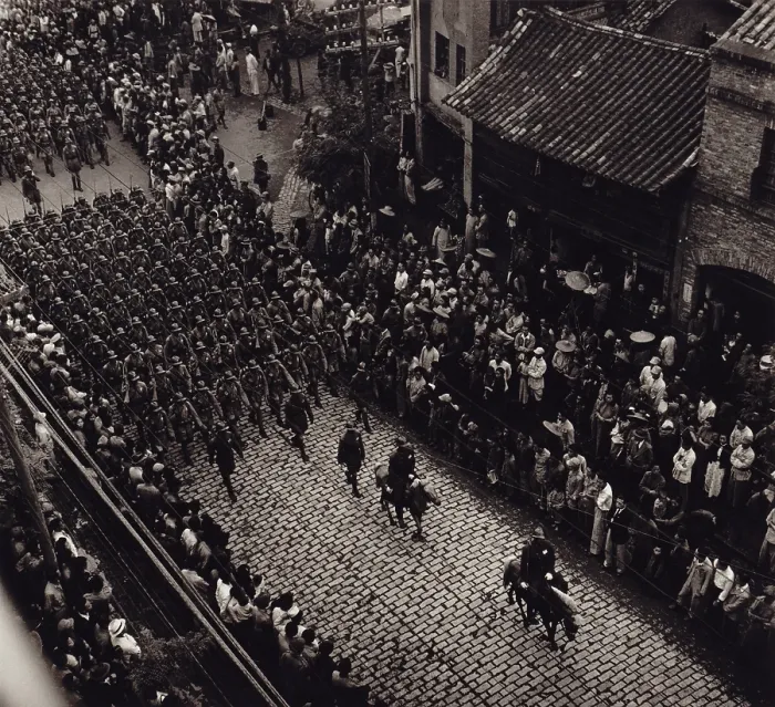 Framed Print : Overhead view of provincial troops marching along a city street in China. Photo taken in Kiangsu Province or Yunnan Province. By Arthur Rothstein, 1946. - (BSLOC_2014_15_166)