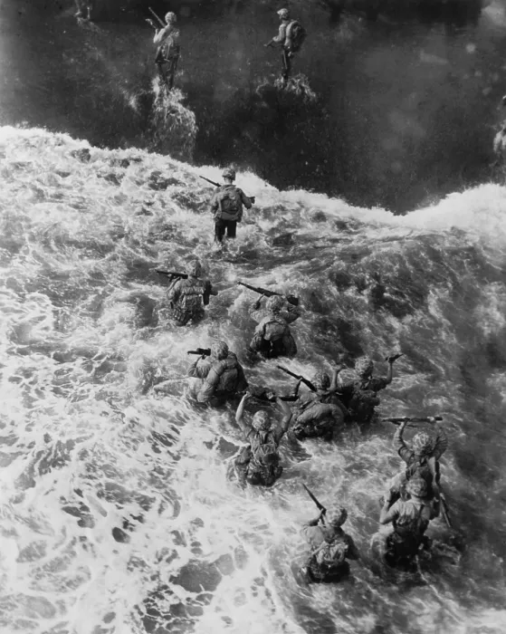 Framed Print : Overhead view of U.S. Marines taking the beach at Cape Gloucester, Papua New Guinea. Dec. 26, 1943 Framed Print : Overhead view of U.S. Marines taking the beach at Cape Gloucester, Papua New Guinea. Dec. 26, 1943