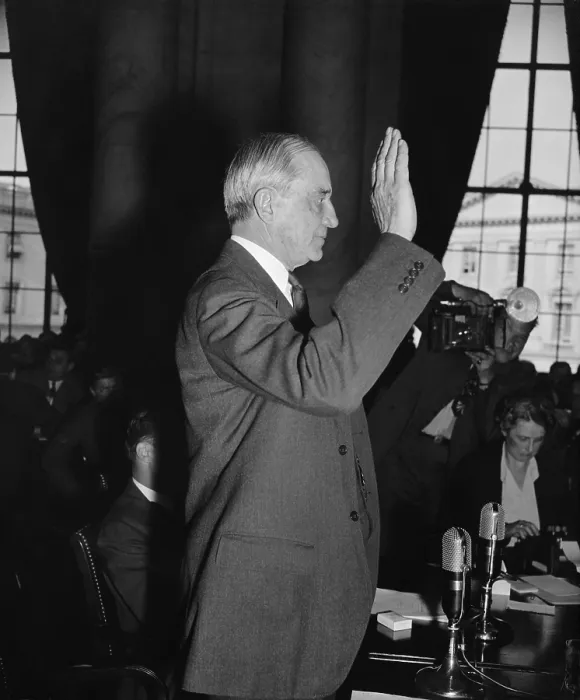 Framed Print : Owen D. Young, Board Chairman of General Electric, May 17, 1939. He is being sworn in before testifying to the Monopoly Committee. (BSLOC_2013_7_128) Framed Print : Owen D. Young, Board Chairman of General Electric, May 17, 1939. He is being sworn in before testifying to the Monopoly Committee. (BSLOC_2013_7_128)
