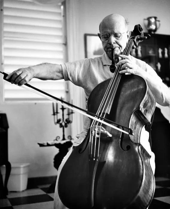 Framed Print : Pablo Casals celebrates his 85th birthday by smoking one of his 16 well used pipes and playing his cello. San Juan, Puerto Rico, December 29, 1961