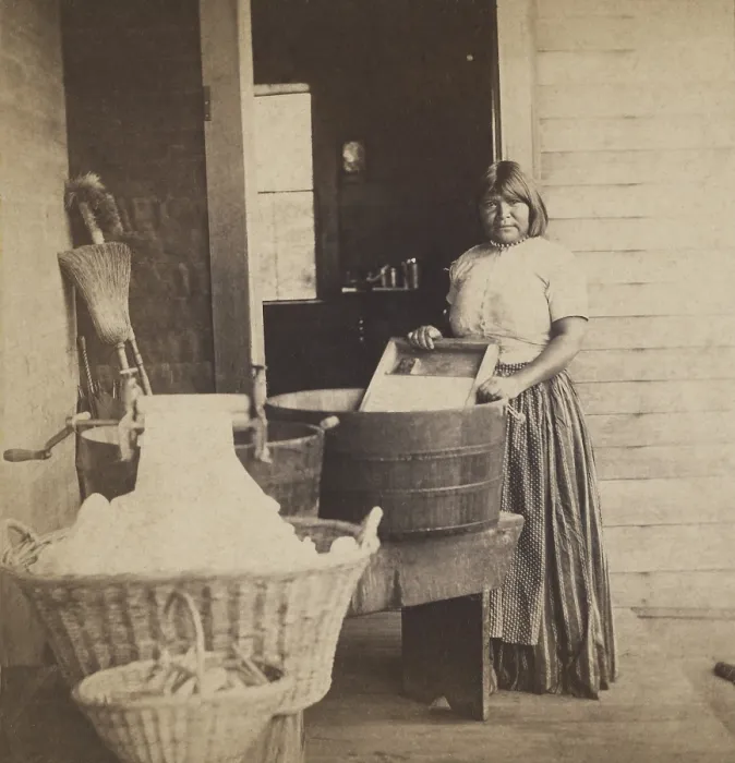 Framed Print : Paiute Squaw does laundry at her Yosemite Valley home using a manufactured scrubbing board and crank wringer in 1870
