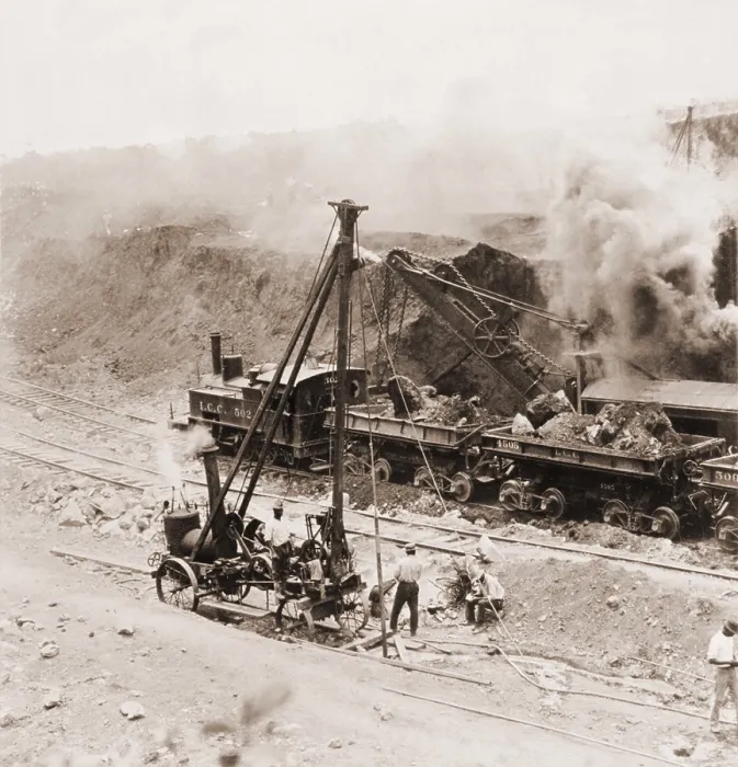 Framed Print : Panama Canal construction. A steam shovel loads excavated rocks into railroads cars at Gatun Dam site, Panama Canal Zone. 1910