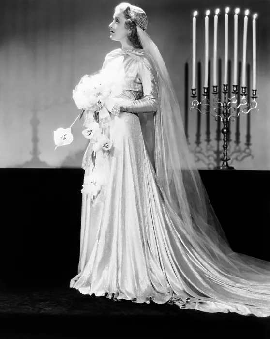 Framed Print : Paramount starlet Ellen Drew, modeling the latest in wedding fashions, by Edith Head, 1939