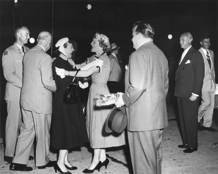 Framed Print : Pat Nixon embraces Mamie Eisenhower at National Airport. July 15, 1955