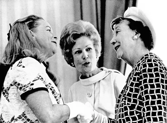 Framed Print : Pat Nixon, introduces Martha Mitchell (left), the flamboyant wife of the Attorney General, to Mamie Eisenhower at a White House reception for Senate wives. May 22, 1970