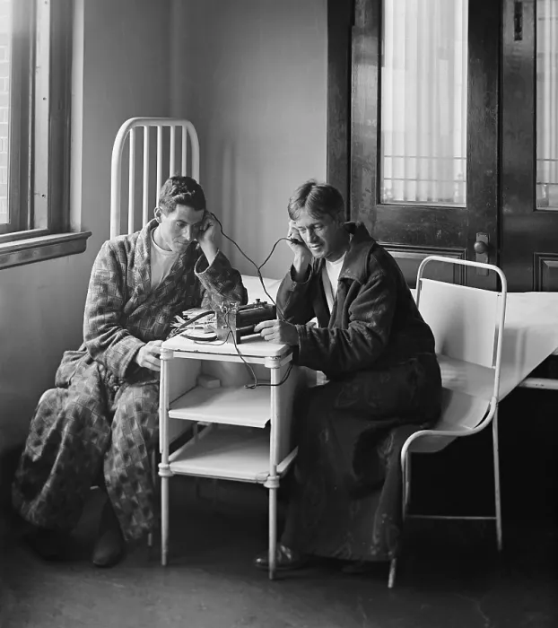 Framed Print : Patients in bathrobes listening to a radio at Garfield Hospital, in 1924. Radio entertained many and eased the isolation of those confined by illness Framed Print : Patients in bathrobes listening to a radio at Garfield Hospital, in 1924. Radio entertained many and eased the isolation of those confined by illness