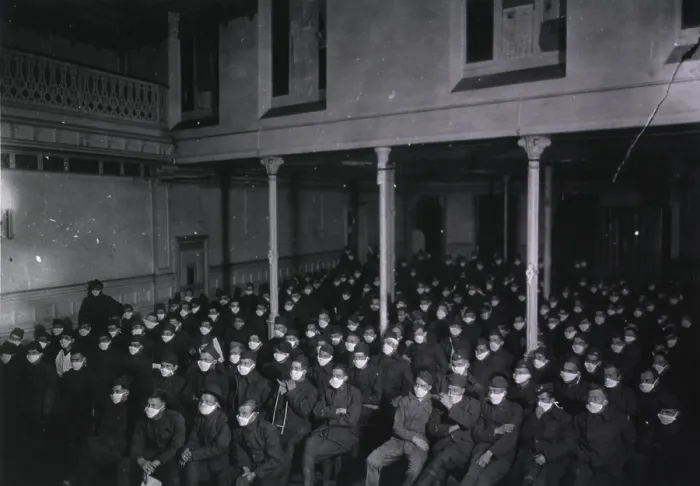 Framed Print : Patients of the at U.S. Army Hospital Number at Royat, France, wearing masks at motion picture show because of an influenza epidemic. 1918