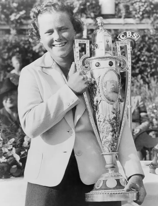 Framed Print : Patty Berg, (1918-2006), holds her trophy after winning the National Women's Golf Championship at the Westmoreland Country Club. Sept. 25, 1938