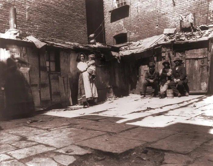 Framed Print : Paved yard lines with outdoor latrines in one of the city's worst slums on Jersey Street, where poor Italians immigrants lived in New York. 1889 photograph by Jacob Riis Framed Print : Paved yard lines with outdoor latrines in one of the city's worst slums on Jersey Street, where poor Italians immigrants lived in New York. 1889 photograph by Jacob Riis