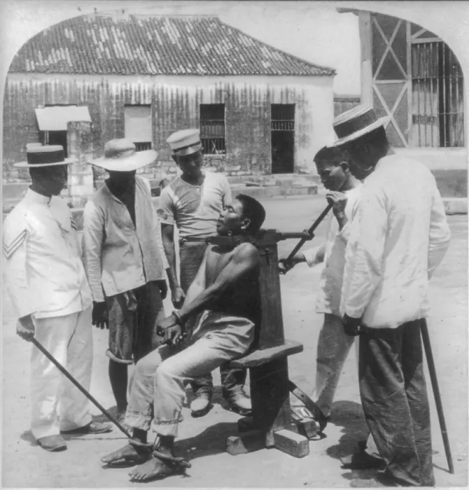 Framed Print : Paying the death penalty for crime, garroting a criminal at Bilibid Prison, Manila, Philippine Islands, 1901