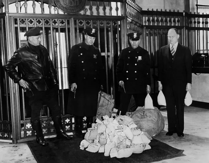 Framed Print : Payroll money for Detroit Workers. Police guard money arriving at the Chrysler Emergency Bank in Detroit
