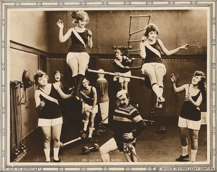 Framed Print : IT PAYS TO EXERCISE, bottom center: Chester Conklin on lobbycard, 1918