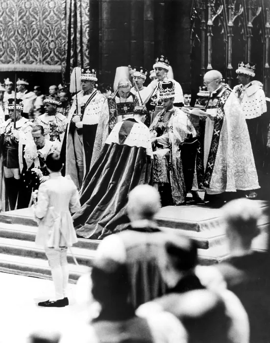 Framed Print : Peers, present in Westminster Abbey, London, May 12, on the occasion of the coronation of Queen Elizabeth I, who pays homage to King George VI, shown seated on his throne Framed Print : Peers, present in Westminster Abbey, London, May 12, on the occasion of the coronation of Queen Elizabeth I, who pays homage to King George VI, shown seated on his throne