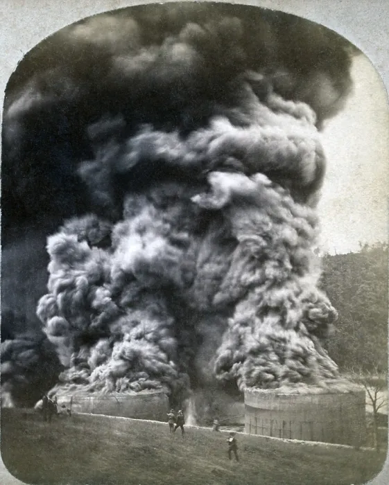 Framed Print : The Pennsylvania oil region. Black smoke spewing from the tops of two oil storage tanks shortly after they burst into flame at the Imperial Refinery near Oil City, Pennsylvania Framed Print : The Pennsylvania oil region. Black smoke spewing from the tops of two oil storage tanks shortly after they burst into flame at the Imperial Refinery near Oil City, Pennsylvania
