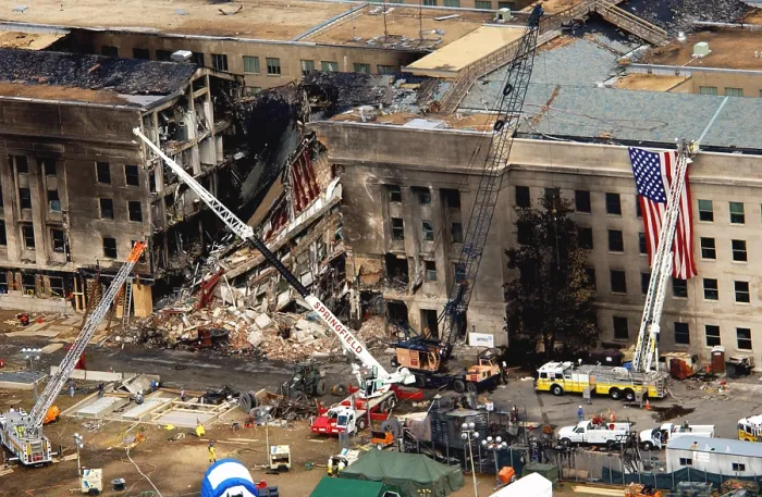 Framed Print : The Pentagon showing the impact point two days after a hijacked American Airlines Flight 77 was crashed into the building on Sept. 11 2001